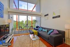 10/19 Gadigal Avenue, Zetland NSW 2017 Set in a commanding position directly overlooking Joynton Park, the property soaks in a lush green aspect through its double height, floor to ceiling glass windows which can be gazed through from the living or bedroom area in this spacious loft. What's important to you? - One of the largest 1 bedrooms in the area, set over 71sqm. - Positioned right on the park, this gives a sense of nature, something not found this close to the City. - Being a loft, double height ceilings elude space and light as well as plenty of living space. - Double height floor to ceiling glass windows in the lounge help bathe the property in natural light. - The bedroom not only has a study nook but also its own outdoor atrium. - Gourmet Kitchen appointed with stone bench top and chic stainless steel appliances. - Timber decked terrace from which to enjoy the lovely park aspect. The local's point of view - Straight out your door step will be the new East Village shopping centre, which will bring a trendy, vibrant and fresh food focused district to the area which will be totally unique to Zetland (shopping centre under construction, completion October 2014). - Set amongst Victoria Park's 13,000sqm of parkland and greenery. - On the doorstep is off the leash Joynton Park, a vibrant place where all the locals meet. - The cafe culture is abundant with some of Sydney's coolest spots like The Grounds, Kitchen by Mike, AllPress, Fratelli Fresh, Sonoma, Headquarters by Luke Mangan and The French House - Transport made easy with a multitude of bus services within 300m, including routes to CBD, UNSW & Coogee with a short walk to Green Square Station (1 stop to central). 