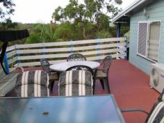  22 Ashton Street Macleay Island Qld 4184 Situated in a quiet Street this lovely home is kept private from the road with established large shrubs at the front of the property.  It is fully fenced with 6 ft fences at the back of the lovely yard that has beautiful massive palms among the gardens.  Enjoy summer with your fenced swimming pool and barbecue on the huge decks on the side and back of the home. Downstairs is perfect if you wish to work from home, with an office set up in one of the rooms and another room free as a 3rd bedroom. The two bedrooms upstairs have fans and wall heaters as well as built in wardrobes.  The home has raked high ceilings for an extra feeling of space. There is a bathtub and separate toilet, and the kitchen is modern and spacious.  There is air conditioning in the main living area which has screen doors out on to the deck.  There is also a double carport and garden sheds. A lovely home, close to the jetty and shops.  The vendor would love to rent back the home after sale, so you have a built in tenant if you want one. 