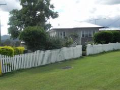  82 Atthow St Kilcoy QLD 4515 This beautiful 3 bedroom weatherboard home is situated in one of Kilcoys
 best positions. Close to the Golf course and hospital and perched up 
high enough to take in the glorious mountain views and catch the cooling
 afternoon breezes. 
 The home itself has a wonderful warm feel about it and has been 
lovingly and thoughtfully renovated to recreate the cosy feel of 
yesteryear. The kitchen is a chefs delight with plenty of bench space, 
and a gas cook top. The adjoining dining room is airy and spacious and 
opens onto the deck which is perfect for entertaining. A private roomy 
lounge and two good sized bedrooms (both with built ins) and bathroom 
complete the upstairs. The upper level of the home features gleaming 
polished timber floors. Down stairs is the third bedroom with ensuite ( 
perfect for the teenager or elderly parents), laundry and room for 
entertaining and car accommodation. 
 The home sits on a 993 sq mtr corner block is partially fenced and has low maintenance gardens. 