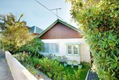  11 Pacific St Watsons Bay NSW 2030 Seconds from the sands of beautiful Camp Cove beach, this beach side quaint three bedroom bungalow offers a wonderful lifestyle in the heart of Watsons Bay. Modernised bathroom and modern kitchen with dishwasher. Floorboards throughout, and boasting a massive level garden and rear off street parking. Rear access allows a thirty second walk to the beach and local park. Perfect for young families and singles alike, this is a Summer haven perfect for Sydney Summer.  