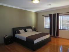 4 Wexford Meander landsdale WA 6065. Have you been dreaming about living in style in a custom designed split 
level home, Well this home is for you, 4 Double bedrooms all with built 
in robes, master bedroom with spa plus study (this room could be used as
 another bedroom) 3 bathrooms, 4 wc's, ducted air conditioning, ducted 
vaccum cleaning system, huge games room, theatre room, huge granite chef
 kitchen, beautiful alfresco area with below ground pool, timber 
flooring throughout the house and much more.