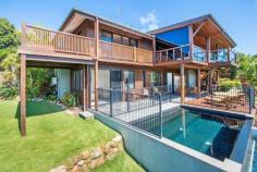  Whitsunday Blvd Whitsunday Islands National Park, Hamilton Island QLD 4803 This stunning low maintenance property features outstanding 180 degree sea and island views, overlooking Whitsunday Island to the east, through to Whitsunday Passage and South Molle Island to the west.  The property also features a 5 bedroom, 3.5 bathroom house designed by Chris Beckingham, is fully furnished & air-conditioned, with in ground wet edge pool and spacious verandahs and patios ideal for entertaining, all surrounded by landscaped tropical gardens and established quality properties   