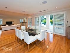  154 Burke Drive Attadale WA 6156 his striking executive residence, surrounded by lovely manicured gardens is set on an expansive 842sqm lot with only parkland between you and the river. Designed and constructed by Domination Homes in 2012 using a grand design, quality materials and excellent workmanship to create a simply wonderful contemporary family home.  The Georgian facade is beautifully complimented by the neatly laid out hedges and white roses in the landscaping. They invite you to follow the beautiful stone walkway through to the gracious portico with double entry doors opening on a grand light filled lobby with crystal chandelier and Oak flooring. Inside you will find a luscious home of grand proportions. Downstairs, overlooking the pool and alfresco, is a large open plan living space. An informal dining and family room fitted with a bar, wine rack and wall cupboard is the central hub of the home and a well designed kitchen with Miele appliances, quality cabinets, sleek stone benches, and well equipped scullery. The adjoining outdoor living space includes a welcoming alfresco patio, an attractive and well equipped outdoor kitchen and a heated swimming pool – a wonderful tranquil place for entertaining and relaxing. In addition to these informal living areas there is also a formal dining room, a theater with installed sound equipment, a full guest bathroom and a large laundry room accommodating a shoot from above and quality cabinets provide copious storage space,  Upstairs is dominated by the presidential master suite with its sumptuous Hollywood bathroom including a spa bath, a North facing balcony with river glimpses - a perfect spot for that morning cuppa - and masses of fitted his and hers closet space. There are three other king sized bedrooms each with their own fully tiled marble bathroom and walk in robe, a spacious home office with double doors and robe recess which would also make a comfortable fifth bedroom and finally a gymnasium with windows East and West so you can enjoy the leafy outlook as you workout. This is an exceptional house with delightful features at every pace and must be seen to be fully appreciated. Some of the things we especially love about it include; • 	 Elegant design and striking Street presence • 	 Stunning Oak flooring throughout living, halls and stairway • 	 High ceilings and neutral decor throughout • 	 Recessed lighting and white timber shutters throughout • 	 Grand entry hall with crystal chandelier  • 	 Open-plan living, meals and kitchen overlook alfresco & pool • 	 State of the art kitchen with well equipped scullery • 	 Theater room and formal dining room on ground level • 	 Laundry with ample storage and outdoor access • 	 Full guest bathroom at ground level  • 	 All bedrooms are king size and have en-suites and fitted robes • 	 Master suite includes spa and balcony with river glimpses • 	 Large home office with double doors • 	 Double remote garage, plus secure boat parking • 	 Enclosed secure store room • 	 Ducted reverse-cycle air-conditioning (with zoning) • 	 Security alarm system and smart wired throughout • 	 Enviable location with only parkland between you and the river • 	 Constructed in 2012, lot size 842sqm house size 576sqm Attadale is one of WA’s most desirable locations, highly prized for its established food, shopping and medical facilities, good transport service, quality private and public schools including the famed Santa Maria College and the wonderful river side playground of Point Walter Golf Course, Point Walter Reserve and the sprawling Attadale foreshore walking paths and cycle ways. 