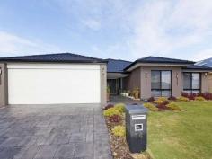  14 Mesa Link Baldivis WA 6171 Situated in sought after location in Tuart Ridge is where you’ll find this stunningly presented 4x2 plus study home. Features; *Double door entrance *4 Bedrooms—Master bedroom with large walk in robe. Other bedrooms can accommodate queen size beds also with walk in robes *2 Bathrooms—Ensuite with double shower and his and her vanity units with china basins. Spacious main bathroom with shower, bath and vanity *Study/activity area conveniently near minor bedrooms *Separate carpeted theatre room with French doors *Huge kitchen with breakfast bar, stainless steel appliances including 900m gas hot plates, chefs oven, rangehood, dishwasher, fridge recess and walk in pantry *Open plan family/meals area *Games room with access to outdoor entertaining area, paved with quality Fremantle Stone pavers *Laundry with benchtop and trough *2 Reverse cycle air conditioning units to master bedroom and living area *Security alarm system *Double lockup garage with access to rear *Automatic reticulated gardens—off the mains *Garden shed *Block Size: 544sqm PERFECT FAMILY HOME 