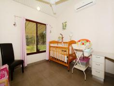 965 Goode Road HUMPTY DOO NT 0836 Start your rural ambitions with this three bedroom home located on a few acres not too far from the Humpty Do shops. Settle in and enjoy this established property that requires only minimal upkeep. Nestled amongst the native vegetation and surrounded with lush green lawns, it is cool and perfectly designed for the couple or the family to move right on in. Raked ceilings add to the specious feel of this open plan living, dining and kitchen area. Painting throughout in neutral whites with tiled flooring as well as air-conditioning, those spaces have been thought out and designed to make the most of the Territory Lifestyle. The kitchen features wrap around counters and a long breakfast bar with seating for 4, a pantry provides ample storage while overhead cupboards, under bench storage plus a fridge nook all complete this functional and elegant kitchen. All three bedrooms are a great size, bedrooms 2 and 3 both feature a built in robe with air-conditioning and tiled flooring while the master is complimented with his and hers built in robes and a two way bathroom acting as an ensuite. The bathroom feats a relaxing bath tub that you could fill with bubbles and take a moment to unwind in, or let the kids slash about for night time baths. Duel linen presses provide a wealth of storage for those extra towels and linen. At the rear of the property is a private in ground spa with an arbour overhead and a brightly coloured bougainvillea winding its way through the eaves. Shade sails provide protection from the sun and a tropical garden bed adds to the privacy. Accessible from the rear verandah, the kids can play in here as you keep an eye on them, or wait for their bedtime for a relaxing twilight dip of your own. 