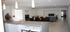  49-53 Glover Circuit, NEW BEITH QLD 4124 "THE REFLECTIONS" at TEVIOT DOWNS The Reflections offers modern living with a stylish acreage design. This well-thought home includes all the trimmings, such as a large Media Room, Study and an Activity room which is ideal as a "chill out" zone for kids and teenagers. The Master Bedroom is separated from the other bedrooms to allow the adults some peace and quiet. With its enormous walk-in robe, storage and linen cupboards, you'll never be looking for storage space again! An open planned Living and Dining Area is over looked by the magnificent kitchen with a bulter's sized pantry, all opening up onto the alfresco making a wonderful area for entertaining. The Reflections really is the design with it all! 