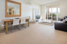 7/5 Tanti Avenue, Mornington VIC Mornington's best apartment building offers ample space and beautiful natural light. Originally, the 'Sisters of Mercy Convent', graced with history and modernised with excellent design features that blends this fabulous apartment into stylish up to date living. Stunning kitchen features stone benchtops, Smeg appliances and polished board flooring. French doors from lounge - dining open to large sheltered entertaining balcony. Master bedroom also opens to balcony. Two bedrooms, two bright sparkling bathrooms and also a work station alcove. Just so, so close to beach, shops, restaurants etc. This apartment will entice those looking to downsize with all conveniences of a modern Mornington lifestyle only strolling distance from every possible amenity.   