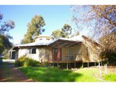  117 Warren Rd Nannup WA 6275 ORIGINAL & DIFFERENT This craftsman built home is not only full of character and light, it makes a statement about how you want to live. This generously sized modern 3 x 2 home with select timber features including polished floorboards is only four years old. Airy and light with high ceilings, the distinctive uplifting design features lots and lots of living space including a snug TV room, large bedrooms, master with ensuite and walk in robe. All painted through in light colours to complement the hand-made timber features. Large custom built shed to the back perfect for a workshop for the handyman with carport for ease of parking cars under cover. Facing the Tomas Marinko Bicentennial Park, it lies close to schools and town shops with easy access to the hospital 