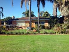  22 WARD CR   Kelmscott   WA   6111 RETAIN AND BUILD TWO POTENTIAL UNITS AT REAR This very well presented home is situated on a large 923m2 block zoned R25/40, with potential to retain this renovated home and develop the rear as there is side access already available. The house consist of a solid 3 bedroom and 1 bathroom brick and tile home which will impress. Features front theatre room, with a featured bulk head ceilings and roller shutters. At the rear of the house is a large games room, with slate flooring and split system air-con and rear access to the patio area. The remaining of the house has reverse-cycle ducted air conditioning, timber floors, down lights throughout and all bedrooms have roller shutters and BIR’S except bedroom 2. WOW! Wait till you see this stunning kitchen with stainless steel 90cm oven and range hood, dishwasher, large fridge recess with overhead wine rack, large corner pantry, double sink with filtered water, plenty of cupboard space and hide away microwave recess. The renovated bathroom has been fully tiled from floor to ceiling with great, featured tiling and has separate bath and shower. The rear of the yard has a fantastic entertaining area and above ground pool and beautiful ... show more View Sold Properties for this Location View Auction Results General Features Property Type: House Bedrooms: 3 Bathrooms: 1 Land Size: 922 m² (approx) Indoor Features Toilets: 1 Floorboards Built-in Wardrobes Dishwasher Split-system Air Conditioning Evaporative Cooling Ducted Cooling Air Conditioning Outdoor Features Carport Spaces: 1 Courtyard Outdoor Entertaining Area Fully Fenced Swimming Pool - Above Ground Floorplans & Interactive Tours Details not provided 