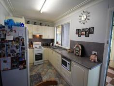  162 Macqueen Street Aberdeen NSW 2336 A Spacious Package This home doesn't look huge from the street but with it's massive QLD room off the back you will find plenty of space. There is a loungeroom at the front of the home with ceiling fan and R/C A/C. A new kitchen with attached dining area plus three bedrooms, the main with a fan and built in robes. The bathroom has been refurbished and there is a separate toilet. The QLD room runs the full length of the home and has roll down blinds for shade. At one end is a portable Spa which the current owners love but are willing to leave at the property for the next person to enjoy. Off the back of the home is a deck area overlooking the fenced yard, there is also a BBQ area. With double off street parking, side access and a single carport and large shed with power this home has the lot. At this price look no further!   