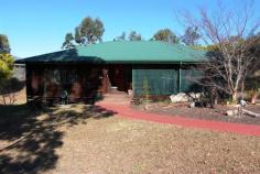  5 Clarke Close Gloucester NSW 2422 A Little Bit Different The warm feel of timber is a feature in this 3 bedroom home which sits on a large 1639 square metre block of land. Set back from the road in a small cul de sac away from traffic noise the outdoor entertaining deck overlooks a large yard with a separate car garage. Inside the home an open living area welcomes you with the hallway leading to 3 bedrooms and a 2 way bathroom. 2 Air conditioners, ceiling fans, polished blue gum flooring and a modern timber kitchen complete the package. 