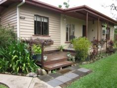  Lot 123 Bruce Highway, Bilyana Qld 4854 Enter the spacious living room from your front covered porch. Plenty of room here and into the country style kitchen with dining area. The laundry and bathroom are off the dining.  The bedroom has a built in wardrobe and there is a separate donga which is used as a second bedroom or a quest room. An office nook next to the main bedroom. Large yard with carport and shed/workshop. Ride on Mower now included as well. Bore water. 