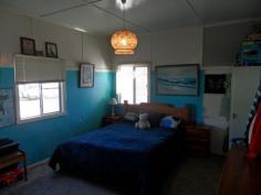 23 Stanton Street Stanthorpe Qld 4380 OPEN THIS SAT (02 Aug) 10 -10.45am. Wow! Check out this price for a property in town! House is rendered with iron roof and brick stumps. 2 bedrooms, small sunroom with effective wood heater, lounge/dining area with easy layout kitchen, bathroom, sep laundry and ideal covered rear deck overlooking family size grounds - good size -1062m2 with garden shed, fenced.  Car accommodation and 16 solar panels feeding back to grid. Just a stroll to nearby local shop and easy quick zip to main street and schools! Seller wants offers NOW! Asking just $175,000..... very little left at this price!  
