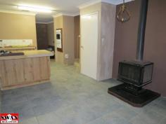  Camillo WA 6111 
 The house itself needs some work but just look at the options that 
you have waiting for you. This 5 bedroom house is situated on a 1307sqm
 block which with the zoning of R15/R25 has the potential for 
subdivision. There is a lot of space to work with, with multiple living
 areas including a bar area off the front lounge, a big kitchen area, 
spacious bedrooms with the master bedroom located at the front, and of 
course the large block which is larger than most you will find currently
 available in Camillo. 

 As well as the well presented cul de sac location this property is 
also conveniently located close to Westfield Primary School (less than 
1km) and John Wollaston Anglican Community School (Just over a km to the
 front entrance, with the back of the school a short stroll away). 

 Opportunities like this one don’t come along very often, don’t kick 
yourself for missing out and come view this property with an eye to 
everything it can become. Make this piece of Camelot into your own 
castle, the potential for this property is just amazing. Call today to 
register your interest as soon as it becomes available for viewing! 

 ~More Photos Coming Soon~ 

 FEATURES INCLUDE:
 • 5 bedrooms
 • 1 bathroom, 2 toilets
 • 1307sqm block zoned R15/R25
 • Bar area off front lounge
 • Spacious kitchen
 • Built in robe space to bedrooms
 • Cul-de-sac with hills backdrop
 • Double carport 
 