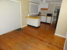  15 Chifley Dr Raymond Terrace NSW 2324 A REAL FAMILY HOME 
 Beautifully presented and maintained home is freshly painted and 
carpeted. It offers 4 bedrooms (3 with built-ins), the lounge has air 
conditioning and combustion fire, formal dining, generous kitchen & 
meals area. There is a separate sunny craft/sitting room and the 
delightful screened outdoor area overlooks the yard. Single garage plus 
carport and a covered spot for the boat or van. Lovely quiet location 
and easy walk to shops, school, etc. It's hard to fault. 
 
   
 
 Property Snapshot 
 
 
 
 Property Type: 
 House 
 
 
 Construction: 
 Brick Veneer 