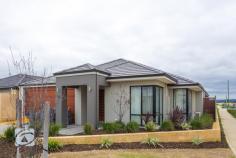  16 Emanuele Bend Harrisdale WA 6112 SHOW HOME LOOKS Situated in the desirable Newhaven Estate, this outstanding home offers modern living spaces on a manageable block. Featuring 3 generously sized bedrooms and a study, you will feel a definite sense of space. Less then two years old, this Ventura built home will suit anyone with its modern layout and quality finishes. Features include: *3 Good sized bedrooms with carpet, master has his and her walk in robes, minor bedrooms have built in robes *2 Bathrooms - Ensuite with shower, glass shower screen and double sink vanity. Bathroom with shower, vanity and bath  *Stunning modern kitchen - complete with stainless steel double sink, gloss black cupboards, 900mm Gas cook top and electric oven, flumed range hood, overhead cupboards and double fridge recess  *Carpeted theatre room *Quality flooring throughout - tiles and floating floor boards  *Split system reverse cycle air conditioning to master and living *Large laundry with ample cupboard space  *Spacious alfresco area under the main roof *Stunning double door entrance with portico *Neat and tidy low maintenance reticulated gardens *Double enclosed garage with direct entrance into the house  *Close to all amenities including Schools (Carey Baptist College and Piara Waters Primary + planned High School), Shopping Centres, Transport links, Parks, Lakes and much more