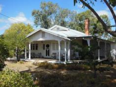  15 Taylor St Tambellup WA 6320  Beautiful Historic Home Situated on a large corner block, this house was built in 1924 in the style of the day with stunning period features and is one of the most attractive in the village. A new roof was put on 4 years ago with the exterior being completely repainted 3 years ago. The bathroom has been recently renovated. Features include 13' ceilings, picture rails, leadlight windows, 6" jarrah floorboards throughout. Two fireplaces and a pot belly stove. 2 bay windows, wide verandahs on 3 sides and R/C airconditioning in the living area and the main bedroom. Exterior walls are timber clad.Scheme water and deep sewerage are connected, This property has great charm and character and would suit those looking for a classic historic home at a reasonable price. Features Air conditioned    Bathrooms    1 Bedrooms    3 Dining    Electric HWS    Entrance Hall    Garage    1 Kitchen/Dining    Laundry    Lounge    Sewer Connected    Storeys    1 Verandah    Water Closets    1 Water Rates: $700 Council Rates: $640 