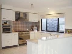  2 Flame Tree Ct, Palmwoods, Queensland 4555 Perfectly positioned in Palmwoods and within easy walking distance to the local CBD as well as the local school, transport shops and cafes. This well presented family home has much to offer as well as its 706m2 block which is great for any growing family,as well as plenty of room for the kids trampoline, caravan, boat or extra cars. Once you enter the property and take in the elevated ceilings which in turn fill the home with natural light and create a sense of space,you immediately feel its warmth. The spaciousness flows throughout and through the kitchen to the family areas and bedrooms and out to the large covered outdoor patio. The four generous bedrooms are complete with built in robes and the master suite offers a good sized ensuite with a corner bath and walk in. If entertaining is your thing then you will definitely be impressed by the well-designed kitchen and its 900mm stainless steel oven and gas cook top as well as the large granite benches perfect for the messy chef in your home. 