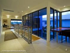  4711 The Parkway Sanctuary Cove Qld 4212 General Features     Property Type: House     Bedrooms: 3     Bathrooms: 3     Land Size: 955 m² (approx) Indoor     Ensuite: 1     Living Areas: 2 Outdoor     Garage Spaces: 3 Inspections Inspections by appointment only. 1. Impressive 709 sqm six star luxury architecturally designed home. 2. Specifically designed for Gold Coast climate with impeccable build. 3. Open plan living and dining areas opening to screened terrace. 4. Grand master suite with huge walk in robe and luxurious ensuite. 5. State of the art kitchen with top of the range Miele appliances. 6. Self contained guest accommodation with two ensuited bedrooms. 7. Private courtyard with solar heated pool. Low maintenance garden. 8. Large study or home office. Powder room. Air conditioned. Fans. 9. Garaging for 2 cars and 2 buggies. Generous 950 sqm allotment. 10. Superb water views. Short buggy ride to Village and Clubhouse. Property Portrait: 