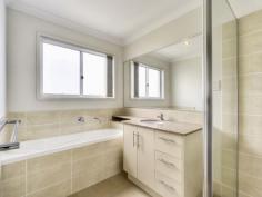 4/21 McAneny St Redcliffe QLD 4020 Price Reduced To Sell !! 
Position; Quality; Value For Money; Rent = A Good, Solid Investment!!I 
have lived on the Peninsula for nearly 15 years; I know it's wonderful 
lifestyle intimately; I speak from experience. It's too difficult to put
 into words; words can't adequately express feelings. That needs to be 
experienced. When you add lifestyle, location, quality and value for 
money to the property features; then what you have is a good, solid 
investment! : Nil Administration and Sinking Fund currently applicable. : 3 Bedrooms. Main Bedroom is extra large and has a huge Ensuite and Walk in robe. Other Bedrooms have built in wardrobes. : 2 Bathrooms. Granite and 2 Pac vanities in Bathrooms with double basins in ensuite. : Open plan Kitchen, Lounge and Dining flowing to a Private Courtyard. :
 Single Lock Up Garage; plus one on-site car space per Unit; plenty of 
Off Street Parking. Unit 1 has it's own private car space. : 
Kitchen has granite and splash backs plus Blanco appliances, a ceramic 
cook top, multifunction oven and range hood and stainless steel 
dishwasher. : Many other features including a Powder Room. Walking
 distance to the Redcliffe Hospital; shopping; transport; just a short 
drive to the pristine waters of the Redcliffe's foreshore; priced to 
sell! PS Don't forget the train line!!