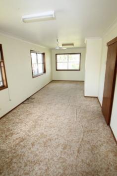  150 Hotham Casino NSW 2470 You could be a winner too, with this 3 bedroom brick & tile home. 
All bedrooms have built-ins and with two living areas there is room for a
 growing family. Set on a large corner block, there is room to play 
both inside and out. The home provides plenty of opportunities for the 
second living area to be converted to a fourth bedroom and separate 
study or a large rumpus room for the kids. Harwood timber floors 
throughout the home are currently covered with carpet. 
This home is ready for a young couple ready to get out of the rental 
market or an astute investor ready to invest in their new rental 
opportunity. 