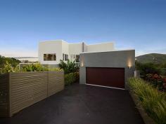 16 Donegal Dr Yaroomba QLD 4573 OCEAN VIEWS TO MOOLOOLABA On a beautiful day you can see to Moreton Island. This is what you have to look forward to when you purchase this carefully designed home strategically perched on four levels to take in the ocean views and the magnificent moods of Mount Coolum. The living areas flow seamlessly to the outdoor entertainment area and to this magnificent view. Entertaining is a breeze in this hostess kitchen with quality appliances and stone benches. Cooking will be pleasant with views in all directions. The main bedroom is located on the top floor with a patio that flows to the outdoor entertainment area. It also has a study nook, walk in robe and a lovely big ensuite. On the next level down is the guest bedroom which also has an ensuite, and is almost a mirror image of the main bedroom. Down another level are another three bedrooms and a bathroom. From this area there is another entertainment/media room leading out to a solar heated swimming pool with a spa, waterfall, and lighting. There is also a gated side access to covered concrete slab for boat or trailer. As you wonder through this wonderful home you notice that the fixtures are all quality and the tiling is striking. Come and discover this home and its many other features and characters. 