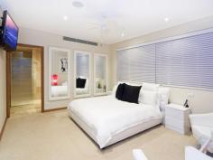  5/61 Garrick Street Coolangatta Qld 4225 This sublime four-bedroom apartment is 1 of only 6 in Coolangatta’s most exclusive residence, and features a high-specification contemporary interior, expansive indoor and outdoor entertaining space and breathtaking panoramic views. Boasting exceptional luxury in every room, this outstanding and stunning home has the ambience of a magnificent retreat perched high on its own hilltop oasis, yet is ideally placed only moments from the restaurants and cafes lining the best beaches on the Gold Coast. From your car park, the lift glides up to your own floor where a grand entrance will meet you as you step inside your own superior showpiece: • Largest whole-floor apartment within this boutique building • Walk to beach • Ocean panorama from Rainbow Bay to Cook Island • Quiet, residential location • Timber bi-folds span whole width of terrace for seamless flow of indoor/outdoor living • Expansive timber flooring, lush carpeting and plantation shutters • Sleek, stylish, sophisticated kitchen with Miele appliances • Teppanyaki bar off kitchen counter • 5 wall-mounted LCD TVs • In-built $35,000 stereo system pipes music around the home • Secluded main bedroom with amazing ensuite and sumptuous spa bath • Floor-to-ceiling tiles in both spectacular main bathrooms • The ultimate guest suite • Audio-visual intercom security • Daikin ducted air conditioning • Three bathrooms including powder room • Very low body corp • Residents’ saltwater pool with thatched Balinese pavilion with BBQ & fridge • Two secure car parking bays • Located on leafy, peaceful street • Master Builders Queensland 2008 Winner Best Residential Building up to $12 Million …and there’s a whole world more of gorgeous features waiting to be discovered… 