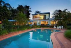 594 The Pocket Rd The Pocket NSW 2483  Supremely Private Haven House on Acreage - Property ID: 717606 This stylishly presented home occupies a supremely private setting that encompasses a resort style with the peace and quiet of the natural surroundings on offer. Designed with the thought of not tripping over each other the floor plan opens itself to the large family that may have the musician/artist. Space is important and the home has a niche for everyone with fantastic separation of the living and sleeping rooms. Refined contemporary finishes combined with rich timbers give the home a comfortable feel and a look that is fitting of this versatile and substantial property. Designed to embrace the natural surrounds,gardens and the in ground pool the timber decks and verandahs are ideal to gather with family and friends The main bedroom is one to spoil yourself, relax in the luxury bathroom with deep soaker bath and enjoy a read on the balcony overlooking the pool and gardens. The idea of being able to pack up for the weekend and enjoy the countryside has always been enjoyable, why not everyday. This property of approx 7 acres is open for horse riding, climbing trees, yabbying in the dam, gardening, picking fruit off the mature fruit trees and finish off with a swim in the pool. Solar power, a large office separate from the main home, covered outdoor entertaining area ideal for games and activities are all a bonus. If you need to work from home the office is situated away from the house. The iconic town of Byron Bay and local beaches are only 20 minutes drive with the Gold Coast Airport 35 Minutes. Print Brochure Email Alerts Features     tractor shed     work/hobby shed     separate office     sewing/artist gallery     solar power     teenager crash pad     fruit trees tropical gardens     Fenced plus dam