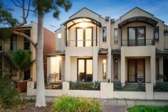 35 John Liston Drive NEWPORT 
Highlights:
 
 The spacious formal lounge room situated at the front of the home, features a gas log heater.
 Contemporary open plan living/dining area featuring a superbly
 appointed modern kitchen with stainless steel Miele appliances, central
 island bench, Caesarstone benchtops and walk-in pantry.
 The three bedrooms are situated upstairs with the light-filled
 master suite featuring air conditioning, a walk-in robe and ensuite 
with spa bath.
 Tasmanian Oak timber floors throughout the downstairs living areas.
 Sleek covered alfresco entertaining area with built-in barbeque, simply perfect for entertaining.
 Valuable rear access to double garage with loft storage.
 Other features include Bose surround sound system, ducted 
heating, evaporative cooling, sunny courtyard and atrium with water 
feature.
 Close to cafes, local shops, Newport train station and only 15 minutes (approx.) to the city centre.
 									 
				 Property Features 
									 Balcony Air Conditioning Built-In Wardrobes Close To Schools Close To Shops Close To Transport Secure Parking Polished Timber Floors 
					 