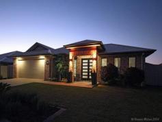  61 Moorhead St Caboolture QLD 4510 Luxurious 5 Bedroom Family Home....... Situated in the highly sought after Central Lakes Estate on a large 607m2 block, resides this fantastic 5 bedroom family home . The property is beautifully presented and no expense has been spared during its construction, with an eye for detail the current owners have built a terrific home that just works for the modern family. Boasting 5 large bedrooms all with built ins and walk in robe to the main, and expansive ensuite complete with dual sinks. Large family bathroom off the bedroom wing and separate toilet. The formal lounge is separate to the beautiful open plan kitchen, dinning and rumpus room all of which over look the large under roof outdoor entertainment area. With fully fenced yard and serious street appeal this home surely must make everyone's short list. Situated close to shops ,schools, hospitals, public transport and the highway it offers the ideal location . Property Features: * 5 large bedrooms ( or 4 + office ) * 2 large bathrooms * Formal lounge * Open plan gourmet kitchen/dinning * Rumpus room * Alfresco entertaining * Fully fenced * Superb build quality * Neutral paint scheme and decor *...show more     View Sold Properties for this Location     View Auction Results     General Features     Property Type:House     Bedrooms:5     Bathrooms:2     Land Size:607 m² (approx)     Indoor Features     Ensuite:1     Toilets:1     Study     Built-in Wardrobes     Dishwasher     Rumpus Room     Outdoor Features     Remote Garage     Garage Spaces:2     Outdoor Entertaining Area 