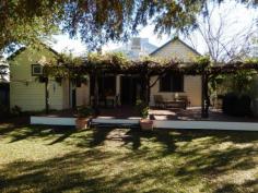  28 Boston Street Moree NSW 2400 AGELESS BEAUTY * 3 large bedrooms, main with dressing room and ensuite * Large centre hallway * Lounge/dining with fire place * Modern Kitchen with ample storage * Bathroom with vanity, toilet and shower over claw foot bath tub * Laundry with additional toilet and shower * Office and separate utilities room, gauzed front verandah * Large entertainment area with timber decking * 3 bay lockable shed with three phase power and cement floor * Six bay solar panels * Large 1,415sq metre block fully fenced   