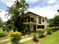 3 Cook Street, Tully, Qld 4854 - Relaxed Living - Fabulous For Families - Janice Gallagher Real Estate - North Ward Nestled at the base of the mountain with a leafy outlook is this 
fantastic family residence that is spread over two levels (floor area 
600m2 approx) enjoying a feeling of space and provides a lifestyle that 
everyone will envy.
 It has been thoughtfully designed to capture great breezes 
guaranteed to impress and its immaculate with its unprecedented natural 
flow, light and spaciousness.
 The home boasts 5 bedrooms with built-ins, 2 bathrooms, study, family room, and games area.
 Huge rear veranda which is perfect for entertaining family and friends.
 5 car accommodation plus abundance of storage
 Exceptionally appointed throughout, this home boasts polished floor, a/c, chef delight gourmet kitchen with huge walk in pantry
 Fabulous sparkling in ground pool and beauty abounds here with low maintenance gardens
 This spectacular property is family friendly and expansive, boasting multiple living areas both indoors and outdoors
 Plenty of grass and gardens surrounding the home for the kids to play on a sprawling 1416m2 allotment
 Schools and shopping all within close proximity
 This location is convenient and practical for your family needs. 