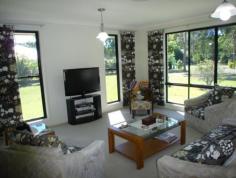  10 Adensfield Court Cooroibah Qld 4565 Gunyah - An Acreage to Call Home Just
 out of Tewantin township at Cooroibah, the home is light, bright and 
airy with its sunny north east aspect and is absolutely immaculate 
throughout. Ideal as a relaxed retirement or family home having 
its separate living rooms, dining just off the kitchen with its own 
personality, breakfast bar, and casual family room with access to a 
northern facing covered patio. Accommodation to suit, having 3 
double bedrooms, ensuite and walk-in robe to master bedroom, plus 
another bedroom that could be the office, with ample storage. The office has a nice outlook and there is a nursery or TV nook as an extension to the main bedroom. Beautifully
 appointed throughout, quality tiles blending with a selection of 
carpet, colourful drapes and high ceilings all add to the atmosphere and
 vibe “Gunyah” offers. Sited on just over an acre of easily 
managed grounds with its sprinkling of mature shade trees, the 
meandering drive ends at the entrance to a substantial 2 bay 55m2 shed 
with plenty of head height to take the largest of caravans or 4 cars, 
etc. A large 2 car garage has internal access to the entry foyer. The list of features that just goes on! "Gunyah" will afford you a wonderful life style just out of town. A must see property that meets our local market. Investment $795000 Contact Warren Evans for further details House Features General Features     Bedroom: 5     Bathrooms: 2 (Ensuites: 1)     Garaging: 6     Land Size: 5031 m2     Fully Fenced Views: Bush Energy Features     Rain Water Tank     Solar Panels External Features     Courtyard     Deck     Garden Shed Internal Features     Air Conditioning     Reverse Cycle Airconditioning     Built In Robes     Dishwasher Specialty Rooms     Study     Workshop 