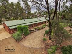  56 Arthy Drive Cedar Grove Qld 4285 Relax in own Private Country Lodge!  This western red cedar home feels like your relaxing at a country lodge. Enter through the front gate to a circular driveway and double carport plus fully landscaped gardens including a fish pond and gentle waterfall and you start to instantly unwind. Inside features gorgeous slate floors throughout, a wood fired stove for those cooler nights adds to the cosy warm atmosphere plus air conditioning for the warmer months. The home has been recently renovated with a gourmet kitchen featuring stone wrap around benchtops and stainless appliances, just add your own touch to the ensuite and bathroom to complete. Entertaining is easy in this home and one entire zone of the house has been dedicated for large get togethers with family and friends. Fully contained Kitchenette and separate toilet, the entertainment room opens out onto an extra undercover area featuring an outdoor spa overlooking the gardens. Ideal for kids, there's plenty to do with a basketball net and skate park set up plus a separate  outdoor room off one of the bedrooms. Large backyard features a 3 Bay Shed (6x9) with an extra high Bay for your boat or truck. Two double sized garden sheds plus an extra trailer shed. This home has character and charm and designed with family comfort in mind. Arrange your inspection today. * 4 Bedrooms, Master with ensuite and large walk in robe. * Timber framed Bi fold doors throughout * Slate floors with woodfire stove and airconditioning * New Kitchen with Stainless applicances, dishwasher and feature rangehood * Entertainment room featuring kitchenette and separate toilet * Undercover entertainment area featuring heated outdoor spa * Separate retreat off kids bedrooms * Large 6 x 9 Shed with extra high bay for your boat or truck * 2 x double garden sheds * Fully landscaped gardens    