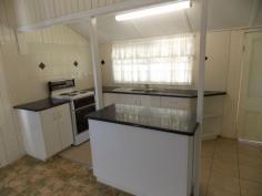 85 John Street, Rosewood, QLD - Bremer Valley Realty Two bedrooms + sleep-out & office 
* Lounge room with A/C 
* Modern kitchen open plan to dining with A/C 
* Renovated bathroom 
* Rear covered entertainment area 
* 878m2 block with room for a large shed 
* Walk to Rosewood shops & schools 