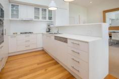 7/5 Tanti Avenue, Mornington VIC Mornington's best apartment building offers ample space and beautiful natural light. Originally, the 'Sisters of Mercy Convent', graced with history and modernised with excellent design features that blends this fabulous apartment into stylish up to date living. Stunning kitchen features stone benchtops, Smeg appliances and polished board flooring. French doors from lounge - dining open to large sheltered entertaining balcony. Master bedroom also opens to balcony. Two bedrooms, two bright sparkling bathrooms and also a work station alcove. Just so, so close to beach, shops, restaurants etc. This apartment will entice those looking to downsize with all conveniences of a modern Mornington lifestyle only strolling distance from every possible amenity.   