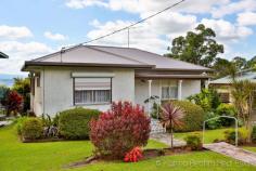 592 Ballina Rd Goonellabah NSW 2480 This home features three bedrooms, one providing access to the sun room. The bathroom located between two of the bedrooms is effectively designed to utilise space. A large lounge area flows through to the dining room with sliding doors. The kitchen boasts an electric stove and hood and leads out towards the deck, which provides a beautiful view of the neighbourhood and surrounds. Stairs lead towards the garden below and behind the home, which can be viewed from two of the bedrooms, the sun room and kitchen. This two tier garden provides northerly elevated views. The laundry is located underneath the house and the carport is situated beside the house and below the deck. Conveniently located on Ballina Road in Goonellabah, this home is close to shopping centres and schools. A stylish view of the house from the road will draw you in immediately.