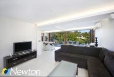 20 Bruce Ave Caringbah South NSW 2229 SUMMER BY THE BAY Privately
 positioned in a tranquil leafy setting with beautiful views across Port
 Hacking, this impressive tidal waterfront home has been designed with 
the modern family in mind. Three separate living areas include a 
dedicated home cinema, a spacious open lounge / dining flooded with 
natural light and self contained entertaining zone on the lower level 
that lends itself to the possibility of guest / In-law accommodation. 
Floor to ceiling timber bifold doors on both levels take full advantage 
of the stunning vista and allow a seamless flow between indoor and Al 
Fresco living spaces. Completing this enviable lifestyle package is a 
resort style pool with entertaining terrace and easy access to the 
waterfront facilities including storage area, ramp and electric winch. KEY FEATURES     Ample off street parking     Boat ramp and winch     Home Cinema Room     Private Tidal Waterfront     Resort style entertaining     Self contained rumpus