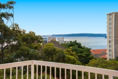  27/4 Mitchell Road Darling Point NSW 2027 This seductive, light and airy strata unit has everything plus wonderful Harbour views from the City to Double Bay. Originally three bedrooms, the apartment has been opened up to a large double living area with a wide north facing balcony, all having beautiful Harbour and district views. There are two bathrooms, one en-suite, a harbour view kitchen with plenty of bench and cupboard space and a separate laundry adjacent. The two bedrooms have north-easterly Harbour aspects that catch the full morning sun as it rises over Point Piper and both have built-ins. The main bedroom has it's own private balcony with glorious Double Bay Harbour views. There is a lock-up garage on the ground floor directly adjacent to the front entrance doors. This well run, well maintained strata building has excellent security, swimming pool, visitor parking and lush manicured gardens. It is located within easy walking distance of Edgecliff Station, is on a direct bus route to the City and sits but a few paces from the only coffee shop in Darling Point. This apartment really is something special plus it has further great potential. Drop by for a look, you won't be disappointed! Call John Knott 0413 328 815 