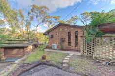  7 Dianne Place Berowra Heights NSW 2082 You won’t find better value. This seventies sandstock brick veneer offers the first home buyer or investor the opportunity to increase the value by thousands & create your own secluded paradise with nature's help. - Open living/dining provides a visual extension to bush views beyond - 3 spacious bedrooms feature built-ins & timber floors - Reverse cycle air-conditioning - Massive entertaining sundeck with views - Lock up garage plus workshop/storage space - Within the neighbourhood is Berowra Village shopping centre, primary schools & amenities 
