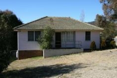  46 Banjo Paterson Cres. Jindabyne NSW 2627 This 3 bedroom 1 bathroom house sits on a 873m2 block in a popular residentail part of Jindabyne. While there is plenty of scope for renovation the house is ready to move into and be comfortable while you plan your improvements. There is plenty of outdoor space on the good sized block and like the indoors there is a garden just waiting to be created. Located within easy walking distance to shops,schools and the lake this is one for the first homebuyers. The property has a good rental history. 
