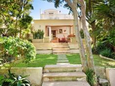 3 Andrews Avenue Bondi et on a generous 380sqm parcel of land with a stunning garden oasis and a
 spacious self contained studio, this stylishly appointed freestanding 
family home captures 180 degree ocean views from its upper level. 
Generous family home set within a beautifully manicured garden 
Intuitively designed to maximise the entertaining lifestyle 
Master bedroom opening onto deck with 180 degree ocean views 
Light flooded split level living and dining area opening onto terrace 
Oversized self contained studio located at the back of the block 
Sleek modern kitchen with quality fittings throughout 
All three bedrooms fitted with built-in robes 
Polished timber floors, skylights, gas fire, air-conditioning, storage 
Positioned in a quiet cul-de-sac just a stroll from Bondi Beach 