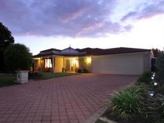  20 Strand Close, ATWELL WA 6164 SOLD ... Space, style and fantastic features combine to create a dream come true.... at a price you can afford. A real 'DESIGNER' experience awaits and the combination of colour scheme and lighting with 2 quite stunning bathrooms take home hunting to a new level. This magnificent home exudes comfort both inside and around the patio and pool area. Hot summer days spent having a 'dip' or reading a book in the shade are made easier with low maintenance gardens and extensive poured limestone. Finished off with glass barrier fencing the pool is also a stunning attraction at night . The warmth of being a home rather then a house makes this a haven to enjoy with your family and friends and the brilliant tree lined cul de sac only heightens the need to view while its proximity to schools and transport make it an A Grade listing.  There may be a better buy somewhere but I haven't seen it so come on, take a look as the owners are not testing the market they're SELLING ! Place this one right at the top of your MUST VIEW list of properties   