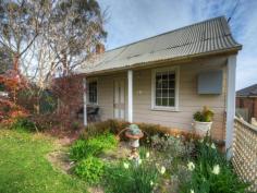  6 Eleanor Street Goulburn NSW 2580 Timber, 2 bedroom Cottage in Goulburn's East. Ideal for an investor or first home buyer. Possible rental return ($235 - $250 a week). Close to Goulburn East Primary.  Features include - 2 Bedrooms – Main with Built in  Kitchen - Stainless steel electric cook top, oven and range hood  Antique Beacon Hill Cast Iron Stove  Gas Heating  Modern Bathroom with Laundry  Rear Deck with views of the city  505m2 Block 