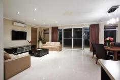 207 Gaebler Road,	
	AUBIN GROVE WA 6164 Closing date Sale 11 August 2014 by 5 pm. The Sellers reserve the right
 to sell prior. They have bought elsewhere and need to move this 
magnificent home HAS IT ALL where family living and fabulous 
entertainment zones blend seamlessly together. Ideal also for extra 
parking a boat or caravan with enclosed side access plus large lockup 
garage and roller door to the backyard, Contemporary design and 
ultimate entertainer full of extras and additions to maximise every 
aspect. Ideally situated a short stroll to the local shops, Aubin Grove
 primary school, nearby parklands, and transport at Lyon Road. Boasting
 a corner garage this connects to a masterfully built outdoor kitchen 
(man cave) with built in oven, barbecue, high spec sink, tap ware and 
built in cupboards. The indoor kitchen provides banks of cupboards,
 central island bench, twin draw dishwasher, under bench oven and range 
hood, the master chef tap ware will impress. High ceilings in the open 
plan living area is a WOW factor. Separate Theatre room, . Step out to 
the Dome Patio to a fabulous backyard were the children and pets have 
room to play, or space for a pool. Extensive exposed aggregate pathways
 and paving. King side Master suite, his/ her robes, ensuite with twin vanity and bath. Spacious minor bedrooms with built in robes and a study. The laundry has plenty of built in cabinetry, storage and the bathroom is conveniently located. 4 Split system reverse cycle air conditioners. Gas Point Twin draw dishwasher Gas hot plates and hot water system Solar Panels Porcelain tiled floors to living areas and carpet to bedrooms. Quality window treatments, drapes, fixtures and abundance of down lights and feature lighting. Security flyscreen front door and sliding doors to patio.   
			 