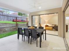 44 Dell Rd St Lucia QLD 4067 A truly superlative locale that is quiet and leafy, yet is within 200m 
of the University of Queensland, brings a central advantage to this 
newly completed contemporary residence. Built over two meticulously 
finished levels, the well designed home incorporates open plan living, 
alfresco spaces and a relaxed liveability that is well suited to a low 
maintenance lifestyle. 
 
Indoors and out, neutral finishes bring timeless appeal, while quality 
fittings and fixtures, including Caesarstone bench tops and timber 
veneer cabinetry all contribute to the polished, sophisticated feel. 
Additionally, a judicious use of both translucent glass and high-set 
windows ensures maximum light and natural airflow throughout the home, 
without compromising privacy. 
 
Surrounded by space for living and dining, the streamlined kitchen makes
 a strong style statement in the main living area, with rich mocha 
tones, stainless steel appliances, plentiful cabinetry and a walk-in 
pantry. Stacking doors allows for easy integration with the outdoor 
living room, while the adjacent media zone brings a separate space for 
more sedentary pursuits. 
 
Upstairs, four large bedrooms all have integrated wardrobes, with the 
main suite making use of a walk-in wardrobe and a spacious ensuite 
complete with dual, above-counter basins and a separate toilet. There is
 a secondary living space on this upper level - ideal for children or as
 a casual lounge, while a powder room, study, air-conditioning and dual 
car garage completes the detailed offering. Outside, the easy-care yard 
brings a secluded space to relax, with tidy gardens, a patch of green 
lawn and a timber sundeck for lazing about. 
 
Along with being so close to the University, the home has the best of St
 Lucia right on the doorstep with shops, parkland and eateries all 
within a short walk and every additional amenity within a few minutes 
drive. 
