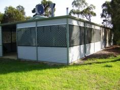  13 Karri St WALPOLE WA 6398 This neat 2 bedroom cottage would make a great holiday home. With verandahs on all 4 sides there is no shortage of room for outdoor entertaining. Also has 2 bay lock up garage. 