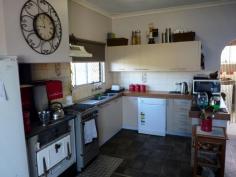  20 Princess Street Pink Lake WA 6450 Tucked away at the end of the cul-de-sac, sits a gardeners oasis. Featuring kitchen/dining with gas cook top, range hood, dishwasher, RC aircon as well as the bonus of cooking a rustic meal upon the wood combustion stove. Timber floors throughout the 3 bedroom fibro residence, just ready to move in and enjoy. Tranquil garden outlook when entertaining within the massive semi enclosed patio. Self-sufficiency is easy with solar panels, well designed veggie patch and chook pen, Jamie Durrie would be proud! 