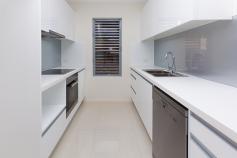  5/31 Palmer Street, Greenslopes Top floor apartment 3.3m high ceilings with fantastic district views. With a contemporary design in a fantastic location, this apartment checks all the boxes when you are seeking a near new luxury apartment which offers great space and flexible living.  Upon entering this spacious 2 bedroom apartment you will be pleasantly surprised by the open plan, quality finisher's and abundance of natural light with 3.3m ceilings  Cleverly designed gourmet kitchen, featuring Miele stainless steel appliances, stone bench tops, all ideally suited for entertaining.  Greenslopes is a well positioned suburb just 6 .3km South of the Brisbane CBD and provides residents with outstanding amenities and a fantastic suburban lifestyle. This apartment has incredibly central location in a quiet cul-de-sac in a leafy setting. With easy access to the M1, excellent schooling options, Griffith University Campuses at Nathan and Mt Gravatt, Greenslopes Private Hospital, Greenslopes Mall, Westfield Garden City and Westfield Carindale - everything really is on your doorstep!  Siting pride of place on the top floor of this boutique complex of eight apartments, it features many fantastic inclusions: - Apartment is on the top floor, with 3.3m high ceiling and receives abundant natural light - Fully tiled living and dining - Large North east facing covered balcony with a sensational uninterrupted district views - Modern kitchen complete with Miele Stainless steel appliances, stone bench tops, two-pac cabinetry with soft close doors and draws - 2 good sized separated bedrooms with built-in wardrobes and easy bathroom access - Master bedroom has an ensuite , walk in robe and direct balcony access - Air-conditioned living areas - video intercom  - Storage cage in secure garage Stylish, spacious and convenient - this apartment ticks all the boxes. Don't miss your chance to own one of the best apartments in Greenslopes. This unique apartment will not last long at this price! Call NOW to arrange your inspection 