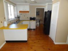  15 Chifley Dr Raymond Terrace NSW 2324 A REAL FAMILY HOME 
 Beautifully presented and maintained home is freshly painted and 
carpeted. It offers 4 bedrooms (3 with built-ins), the lounge has air 
conditioning and combustion fire, formal dining, generous kitchen & 
meals area. There is a separate sunny craft/sitting room and the 
delightful screened outdoor area overlooks the yard. Single garage plus 
carport and a covered spot for the boat or van. Lovely quiet location 
and easy walk to shops, school, etc. It's hard to fault. 
 
   
 
 Property Snapshot 
 
 
 
 Property Type: 
 House 
 
 
 Construction: 
 Brick Veneer 